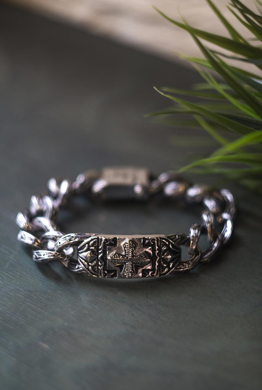 steel bracelet with a cross