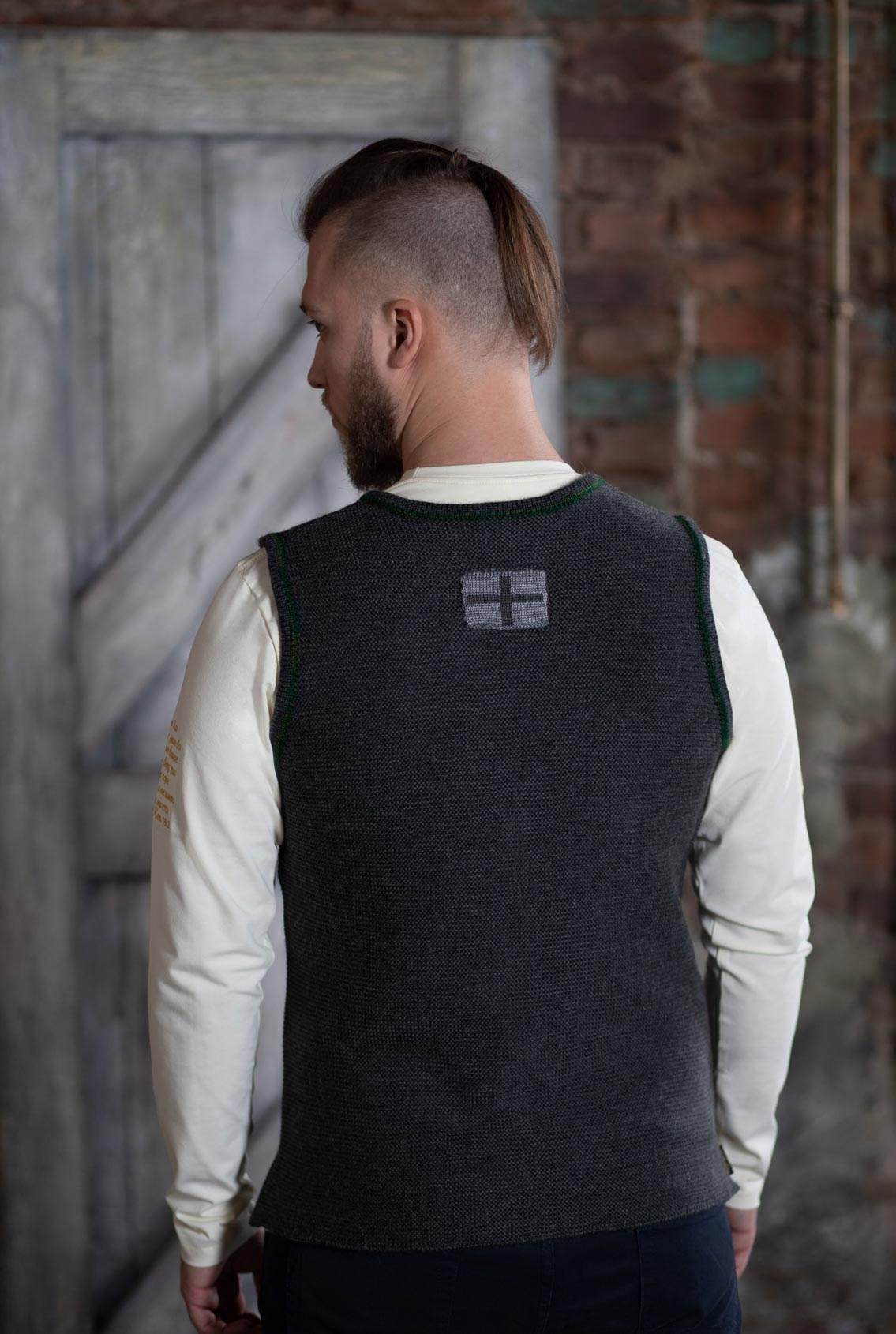 Vest with a cross