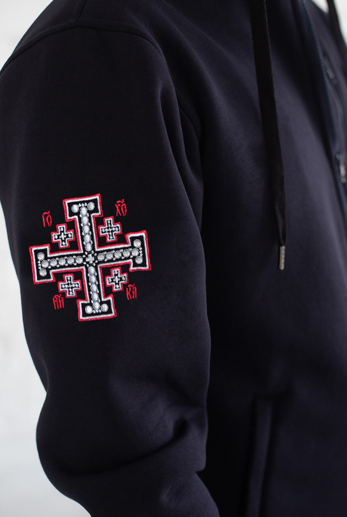 Cross on sweatshirt